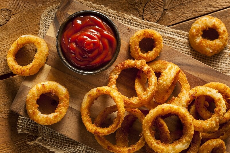 Homemade crunchy fried onion rings stuffed with cheese