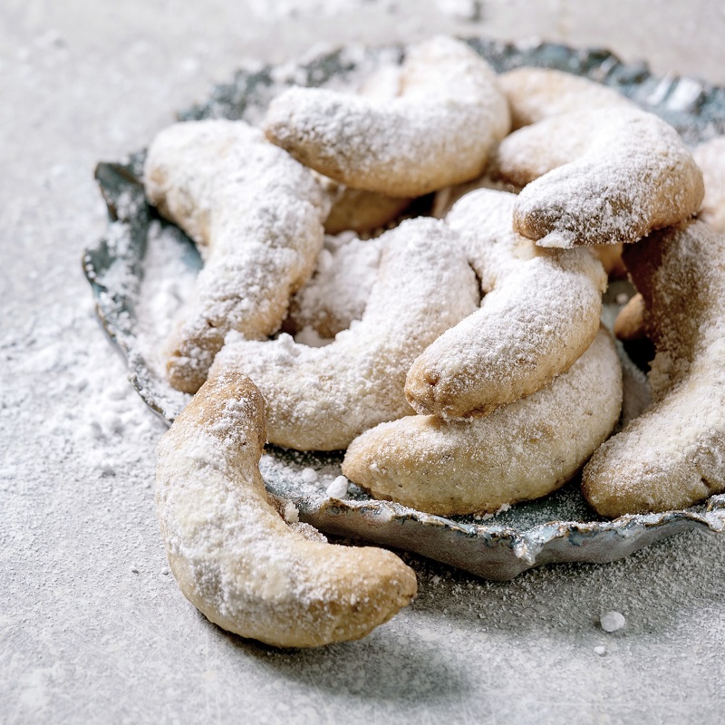 Vanillekipferl, crescent-shaped cookies. A crunchy dessert with a strong vanilla flavor